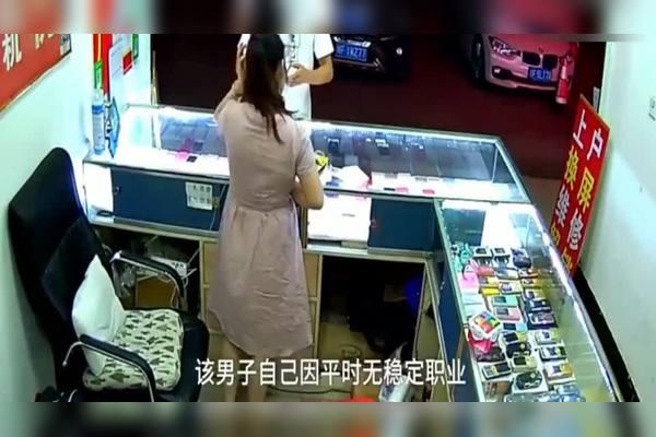 salesperson using tablet in retail store